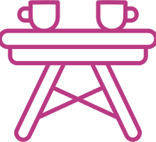 Two cups on a small table icon.