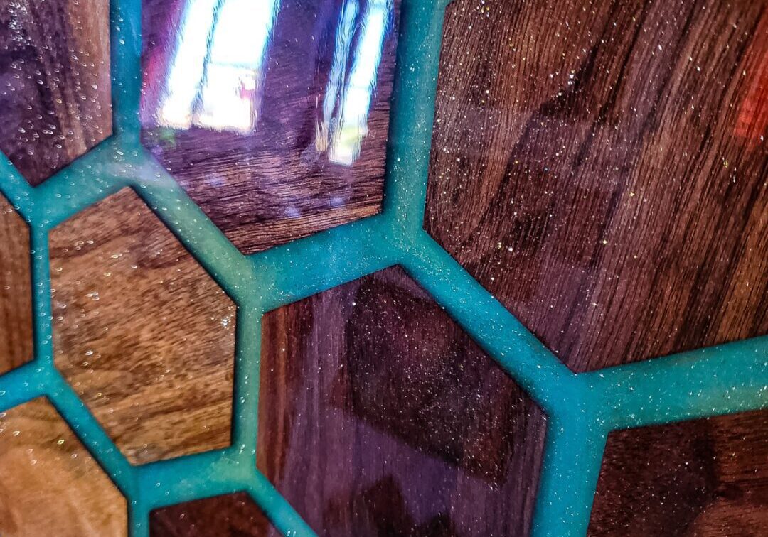 Close-up of a wooden honeycomb pattern with turquoise borders.